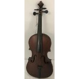 A vintage uncased wooden 1/2 size child's violin.