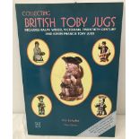 A book entitled "Collecting Toby Jugs" by Vic Schuler