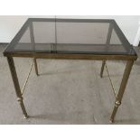 A smoked glass topped brass occasional/side table.