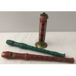 A vintage Heiwa Gakki tin whistle together with 2 vintage recorders.