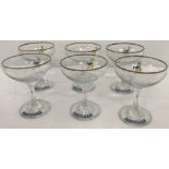 A set of 6 vintage Babycham glasses.