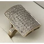 A large 9ct gold pave set diamond dress ring.