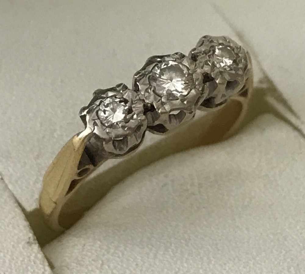 18ct gold diamond trilogy ring.