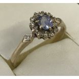 A 9ct gold tanzanite and white sapphire dress ring.