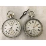 A 935 silver cased pocket watch with subsidiary second hand and complete with watch key.