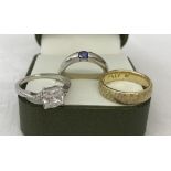 3 silver dress rings.