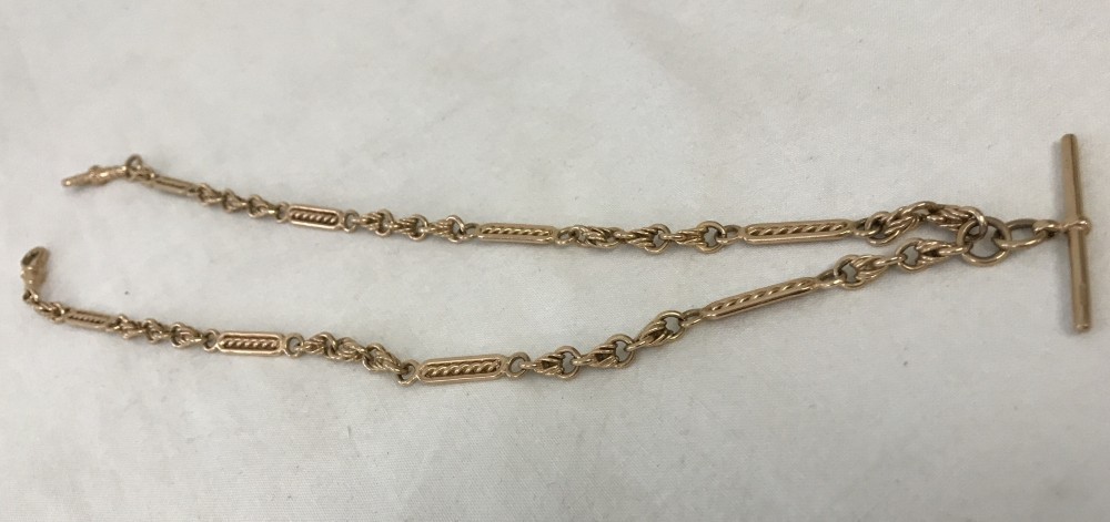 A vintage 9ct gold Albert watch chain with T bar.