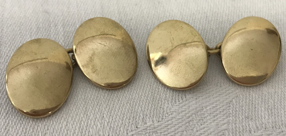 Heavy 18ct gold domed oval cufflinks. No engraving.