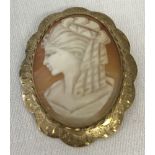 A cameo pendant/ brooch set in 9ct gold.