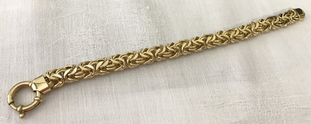 A silver gilt byzantine chain bracelet with large spring ring clasp.