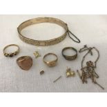 A collection of vintage scrap gold items.