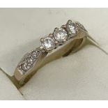 A 9ct gold and diamond trilogy ring.