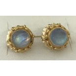 Pair of 18ct gold earrings set with moonstones.