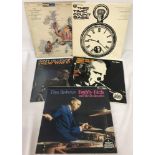 Five jazz music LP's.