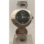 A woman's Seksy Sekonda wristwatch with silver tone circle design strap.