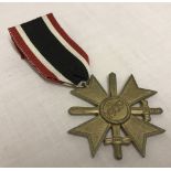 German WWII pattern War Merit cross with swords medal.