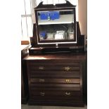 An Art Nouveau 3 drawer dressing chest with swing mirror and small vanity drawers to top.