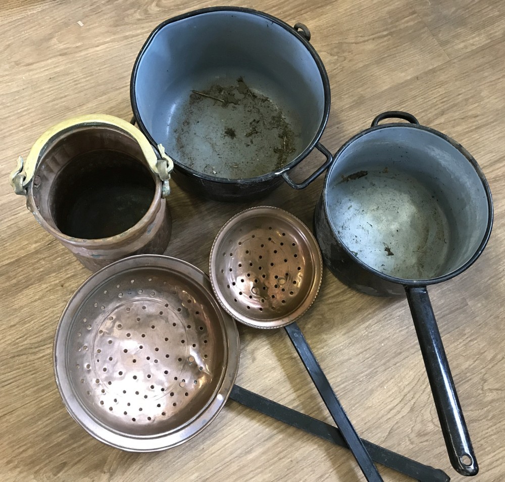 Two vintage enamelled cooking pots together with 2 chestnut roasters and a cooper brass handled pot.