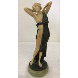 A c1960's bronze & resin nude figure on an onyx plinth.