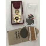 3 assorted medals. A boxed Belgian The Order of the Crown Medal