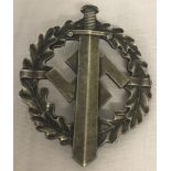 A German WWII pattern keep fit badge.