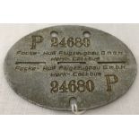 A German WWII pattern Focke-Wulf Factory Armed Guard Dog tag.