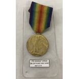 WWI Victory medal with accompanying paperwork.