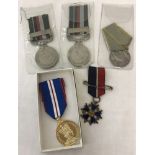 5 assorted medals to include a boxed 2002 commemorative medal