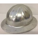 A vintage "Panorama" aluminium helmet with liner.