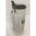 A German WWII Waffen SS engraved lidded stein glass.