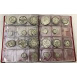 An album of British coinage to include 5 George V 1918 silver coin sets.