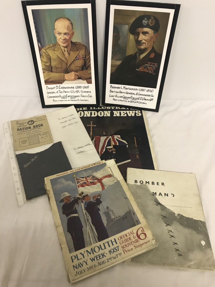 A small quantity of military related ephemera to include WWII ration book and cover.