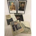 A small quantity of military related ephemera to include WWII ration book and cover.