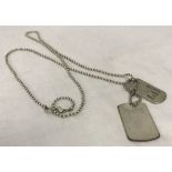 Post WWII dog tags.