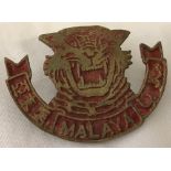 WW2 pattern Malaysian Peoples Anti-Japanese Army badge in debased silver and red paint.