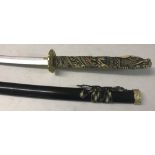 A modern oriental Samurai style sword with carved dragon design handle.