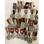 A collection of assorted Swiss medals.