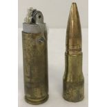 A WWII pattern 50 Cal trench art bullet lighter.