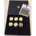 A set of 6 British Legion 90th Anniversary commemorative 24ct gold plated £5 coins.