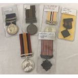 6 assorted medals.