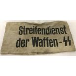 A WWII pattern SS arm band "On Patrol Duty for the Waffen SS!".