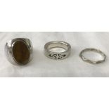 3 silver dress rings.