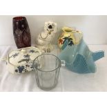 A collection of ceramics and glassware.