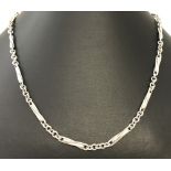 A 17 inch decorative silver necklace with twist and trace chain links.