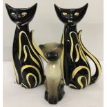 2 retro black and yellow ceramic cat vases together with a Siamese cat figure.