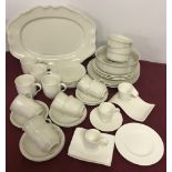 A large quantity of cream coloured Villeroy & Boch ceramics.