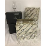 A large quantity of boxed Villeroy & Boch boxed glasses.