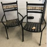 A set of 4 metal framed garden chairs with mosaic tile detail to backs.