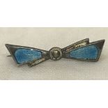 A small Charles Horner silver bow brooch with blue and white guilloche enamel decoration.