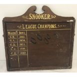 A vintage wooden Snooker score board.